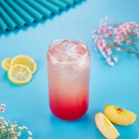 A bright pink drink in a glass, shot for a social campaign